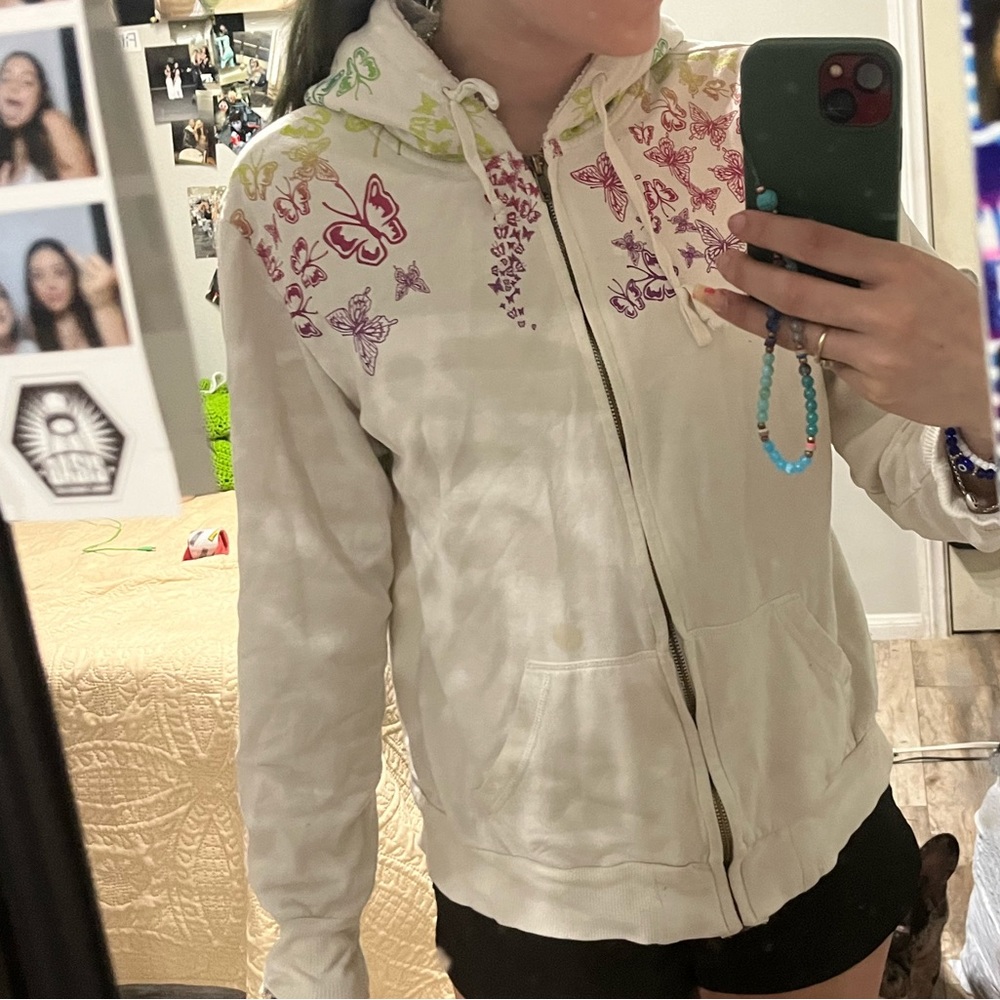 White with colorful butterfly jacket